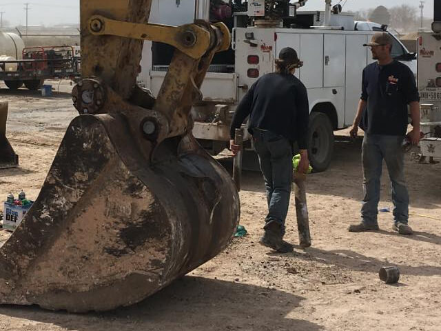 Game Heavy Hauling service techs in the field Service techs in the field